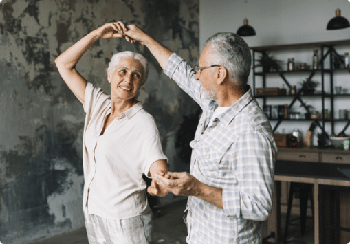 Elderly couple dancing