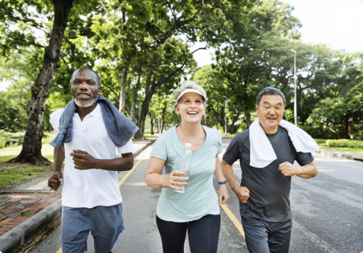 Group of three people running