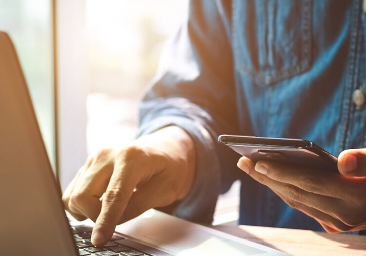 Man typing on computer