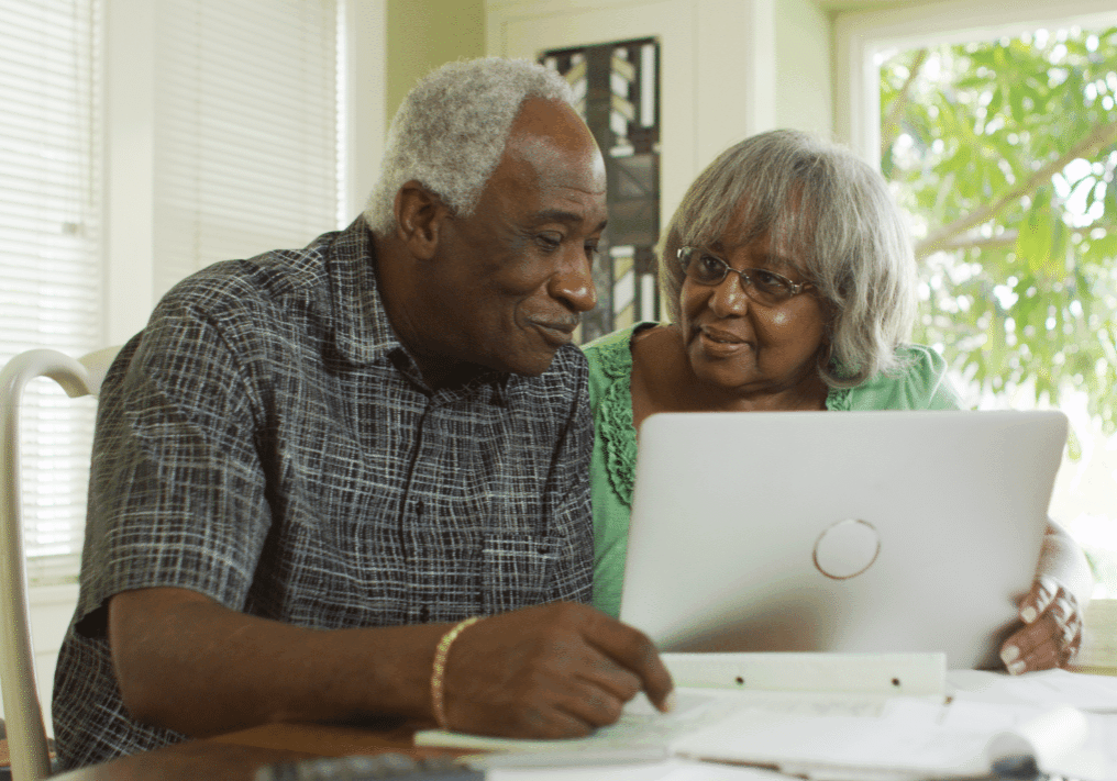 Couple looking at their computer together
